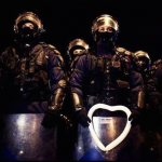 19.-Bucharest-Romania-2012-A-young-boy-offers-a-heart-shaped-baloon-to-police.-2.png