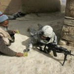 An-Afghan-man-offers-tea-to-soldiers.jpg