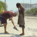 This-photograph-of-a-man-giving-his-shoes-to-a-homeless-girl-in-Rio-de-Janeiro._thumb.jpg