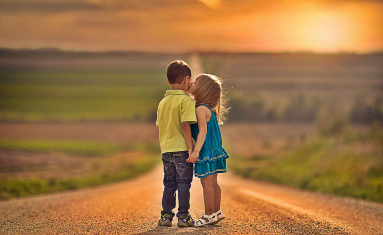 Little Boy And Little Girl Kiss