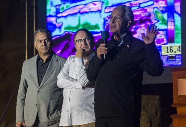 Officials speak in front of the great pyramid of Khufu in Giza.