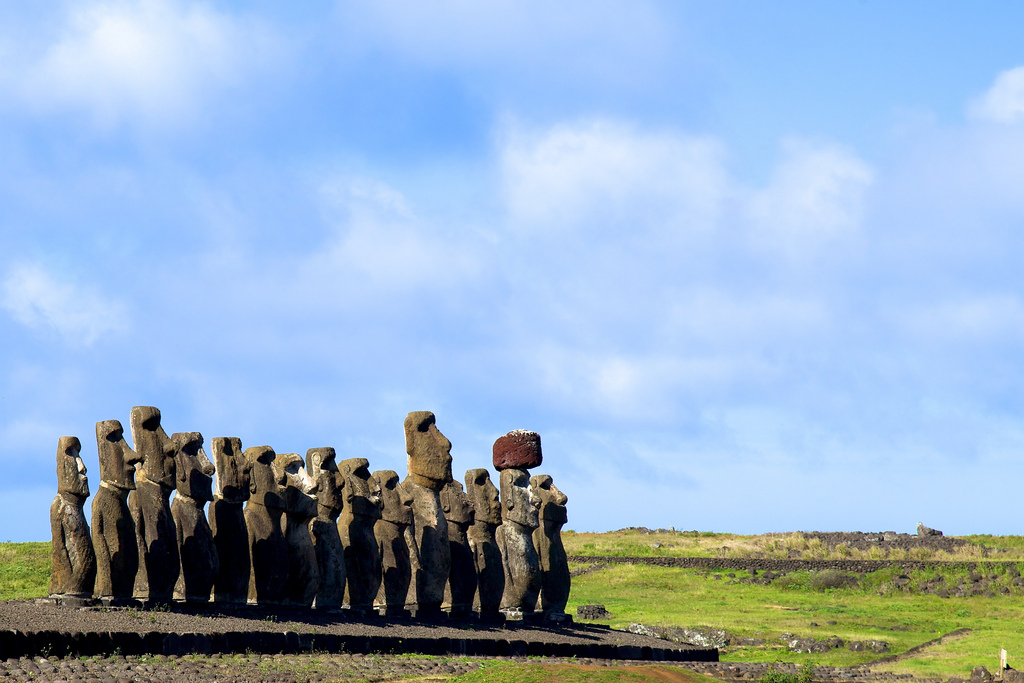 9. strange and ancient Easter Island sculptures as they stand, clustered together